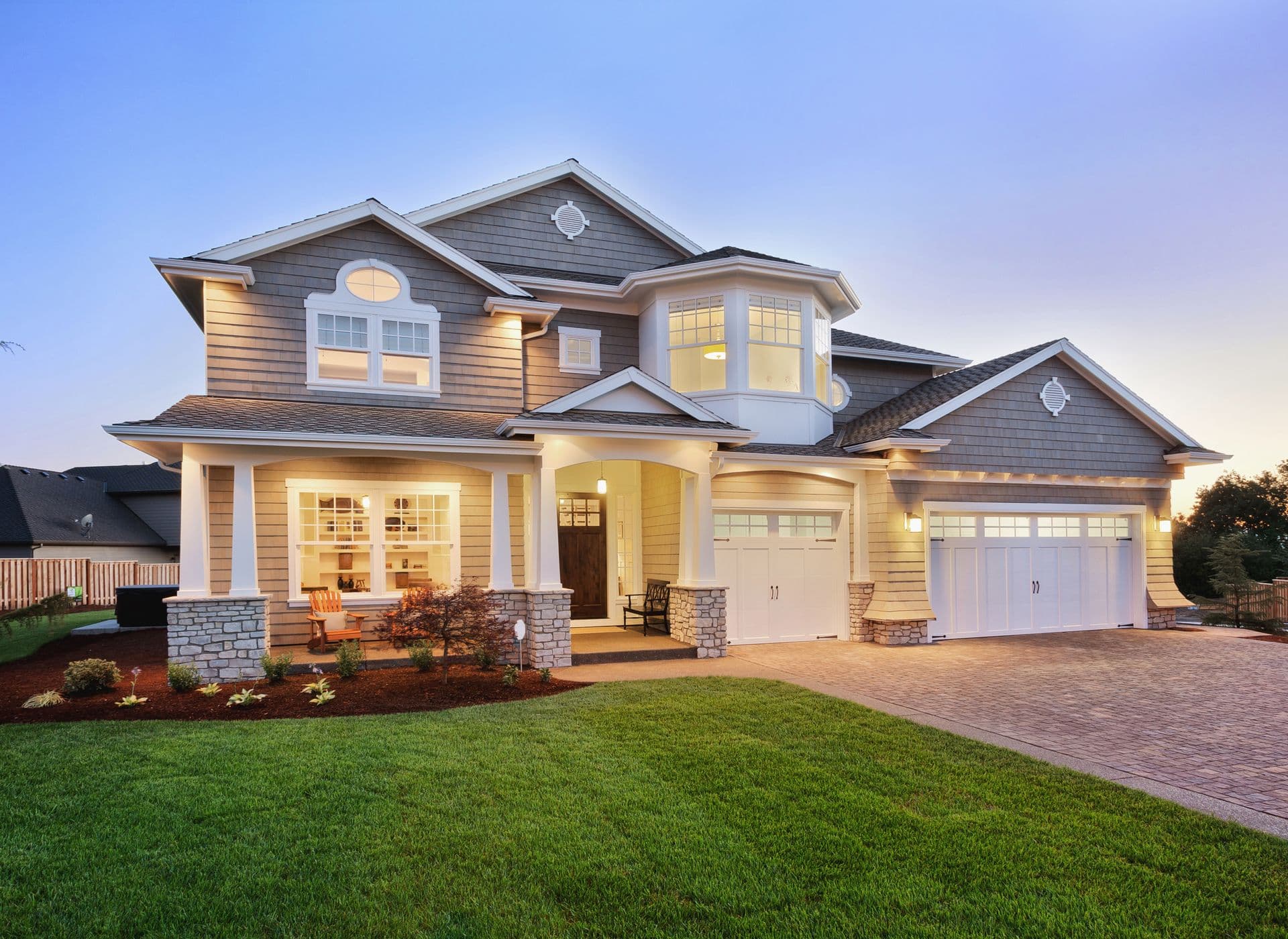 Exterior of home with lights on